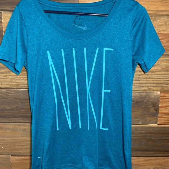 Blue nike exercise shirt. - Picture 1 of 3